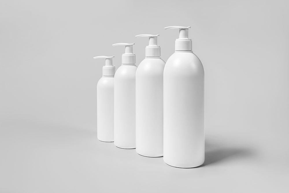Cosmetic Mock up Four Bottles photoshop psd