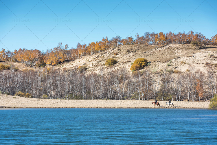 Horseback riding by the lake