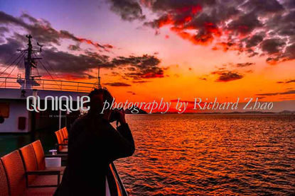 Photographer impression shooting sunset
