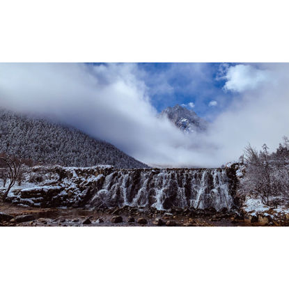 Foggy Snow Mountain waterfall 