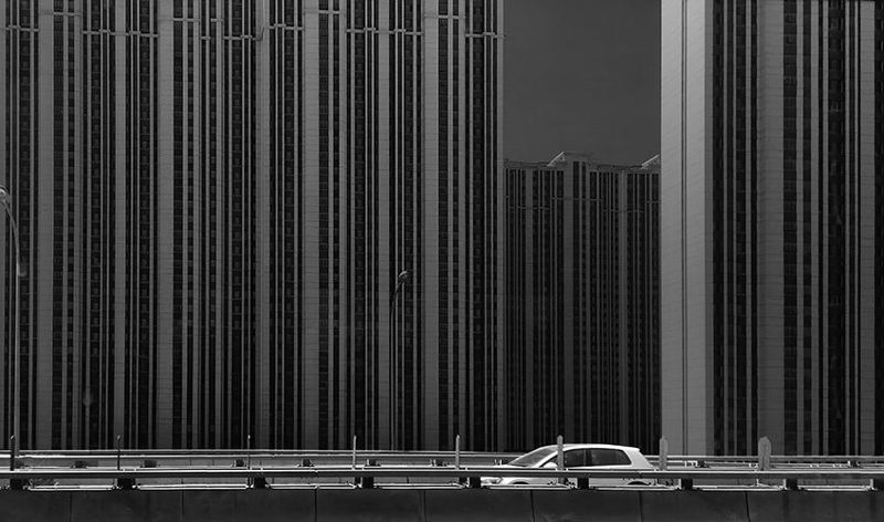 Photos of cars driving on high-rise buildings and expressways